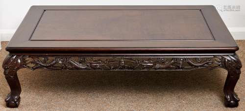 A Chinese hardwood low table, 20th c, with pierced and carve...