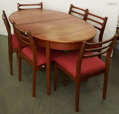 A teak extending dining table and set of six ladder back cha...