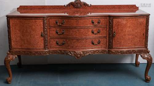 A reproduction walnut sideboard, c1960, the well figured qua...