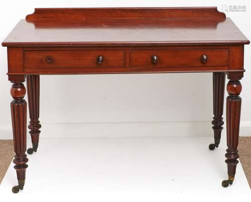 A Victorian mahogany wash stand, the rectangular top with lo...