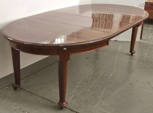 A mahogany extending dining table, c1920's, the oval ended t...