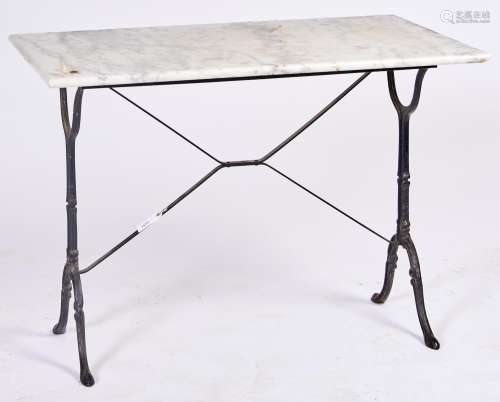 A cast iron table, the rectangular frame on two warped end s...