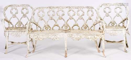 A suite of white painted cast alloy garden furniture, compri...