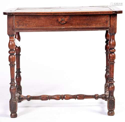 A French provincial walnut side table, early 18th c, the boa...