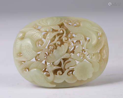 A Carved Yellow Jade Flower-Bird Decoration