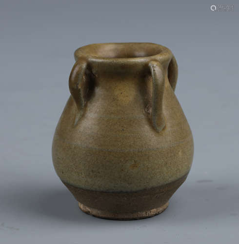 A Celadon Glaze Porttery Jar with Four Handles