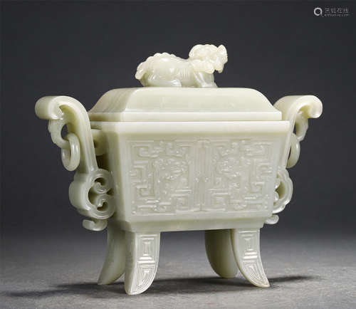 A Carved White Jade Taotie Incense Burner with Double Handle...