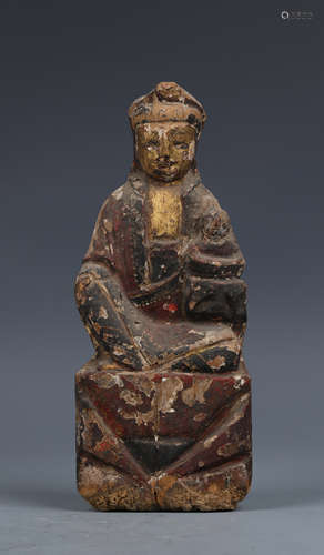 A Carved Wood Seated Buddha