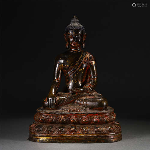 A Gilt Bronze Seated Figure of Shakyamuni