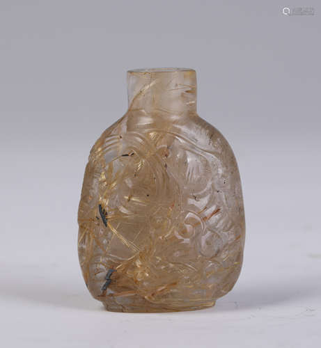 A Carved Quartz Snuff Bottle