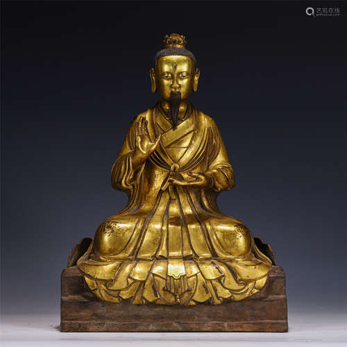 A Gilt Bronze Seated Figure