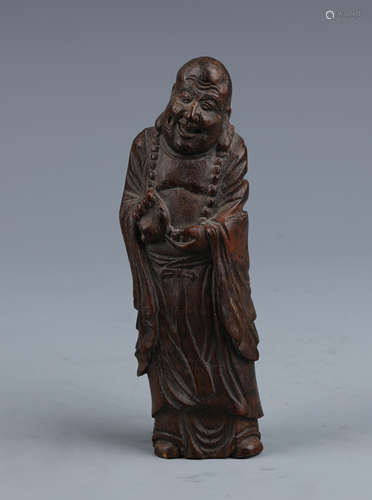 A Carved Bamboo Standing Arhat