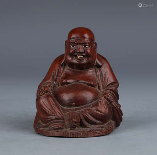 A Carved Wooden Statue of Seated Maitreya Buddha