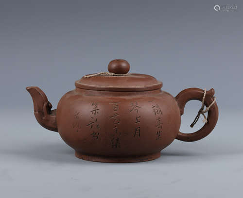 An Inscribed Yixing Glazed Tea Pot