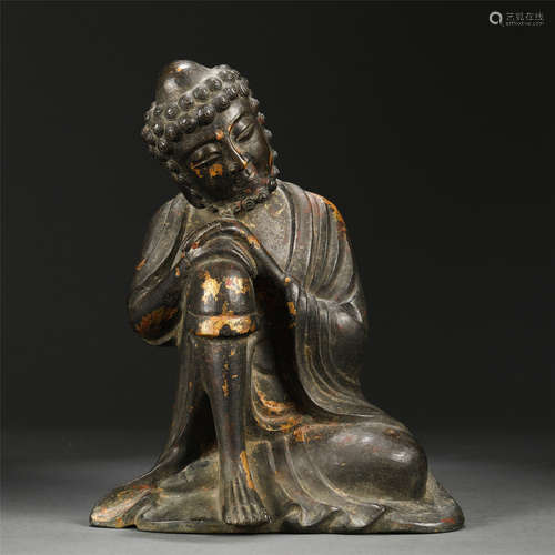 A Gold Mounted Bronze Seated Figure