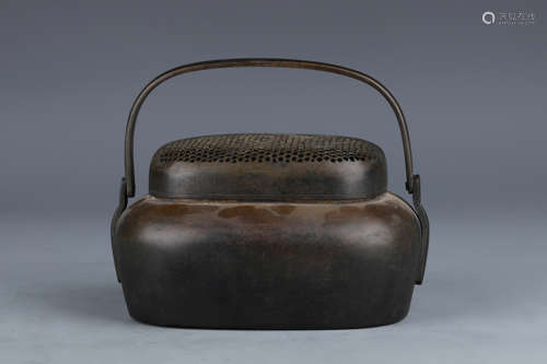 A Bronze Hand-Warmer with Loop Handle