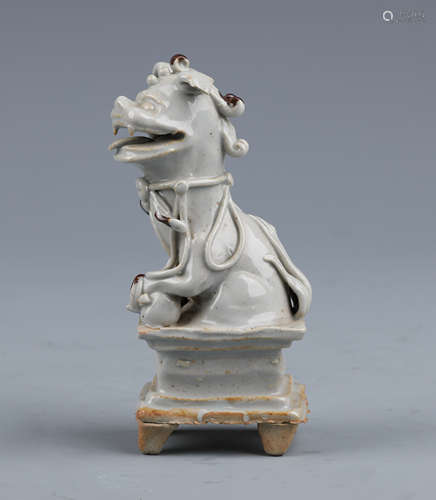 A Shufu-Type Porcelain Foo Dog