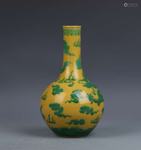 A Yellow Ground Green Enameled Dragon-and-Cloud Globular Vas...