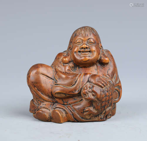 A Carved Boxwood Figure and Toad