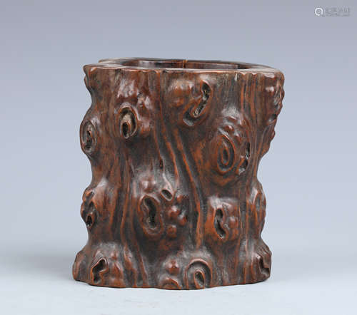 A Huanghuali Wood Natural-Form Brush Pot