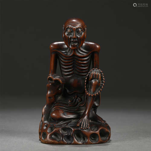 A Carved Chengxiang Wood Seated Figure