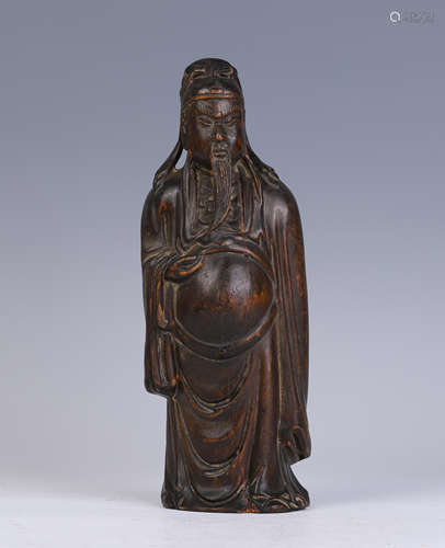 A Wood Carving of Standing Figure