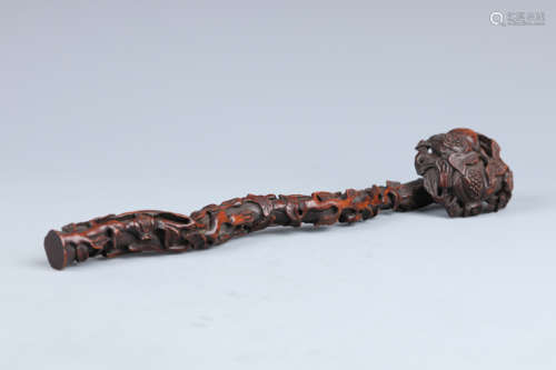 A Carved Rosewood Pomegranate Ruyi Scepter