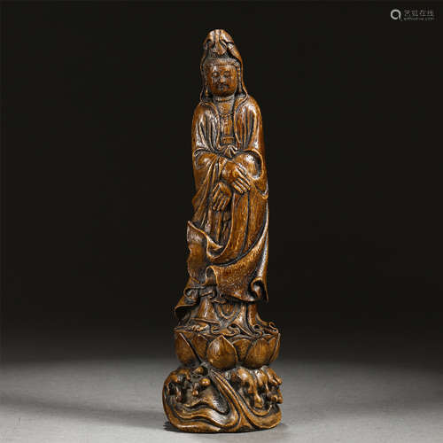 A Carved Chenxiang Wood Standing Figure of Guanyin