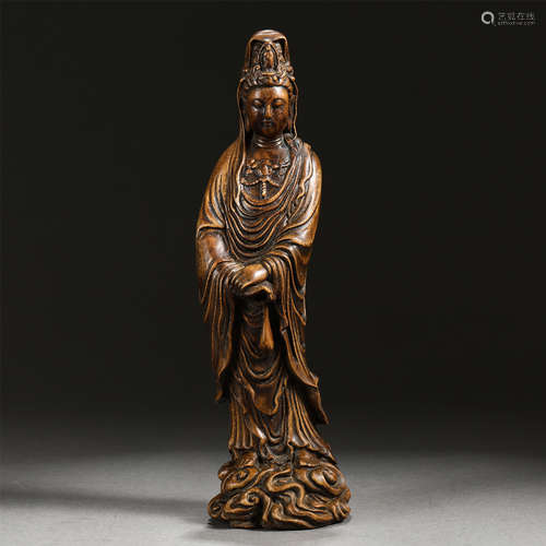 A Carved Chenxiang Wood Standing Figure of Guanyin