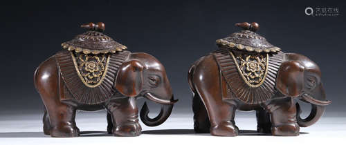 PAIR OF COPPER CAST ELEPHANT ORNAMENTS