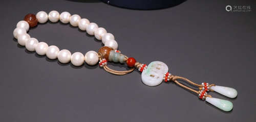 PEARL STRING BRACELET WITH 18 BEADS