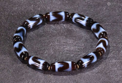 DZI STRING BRACELET WITH 10 BEADS