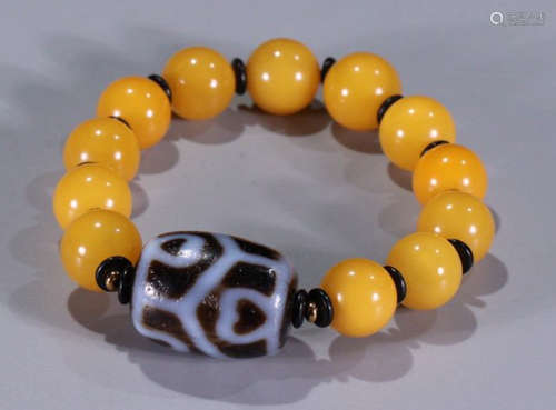 BEESWAX STRING BRACELET WITH DZI BEAD