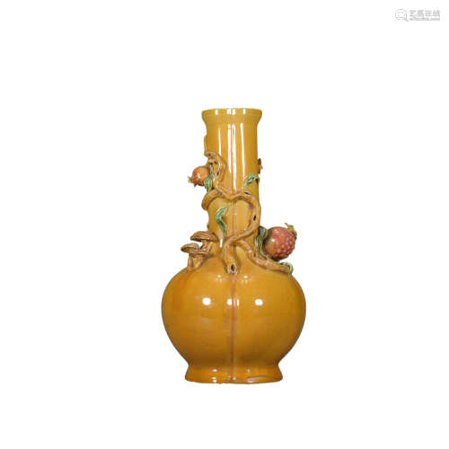 A yellow glazed vase