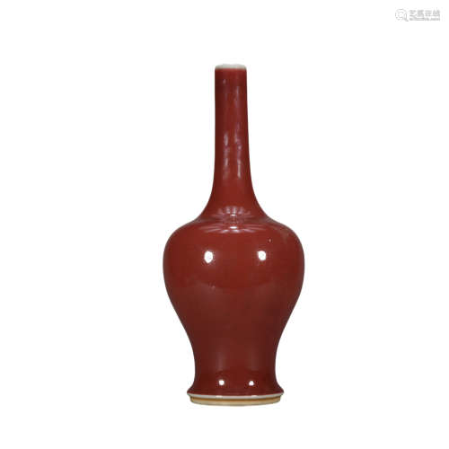 A red glazed vase