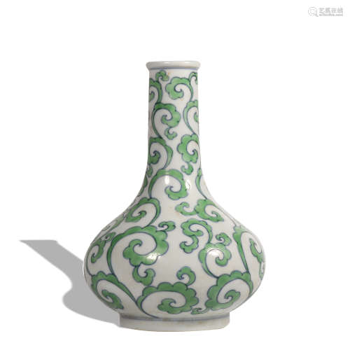 A green glazed vase