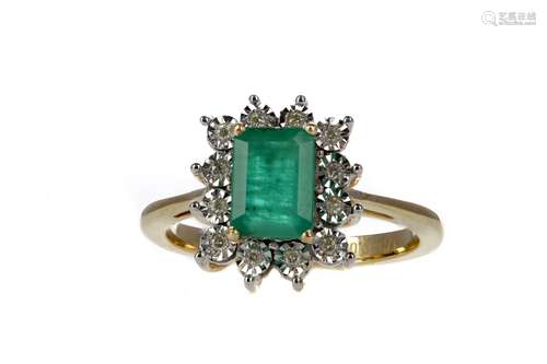 AN EMERALD AND DIAMOND CLUSTER RING