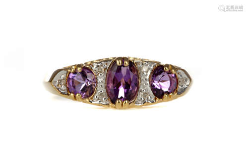 AN AMETHYST AND DIAMOND RING