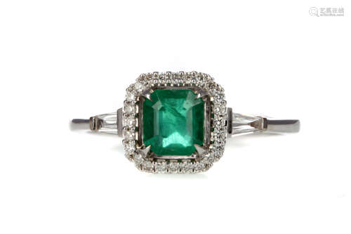 AN EMERALD AND DIAMOND RING