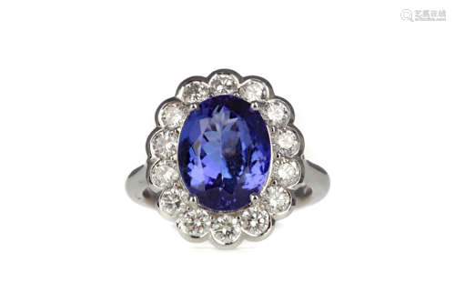 A TANZANITE AND DIAMOND RING