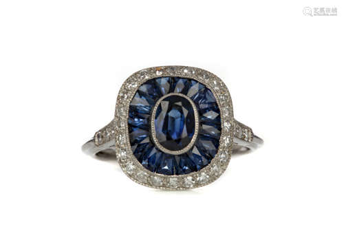 A SAPPHIRE AND DIAMOND RING