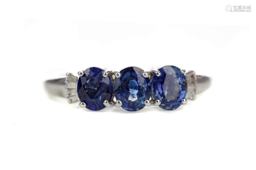 A SAPPHIRE AND DIAMOND RING