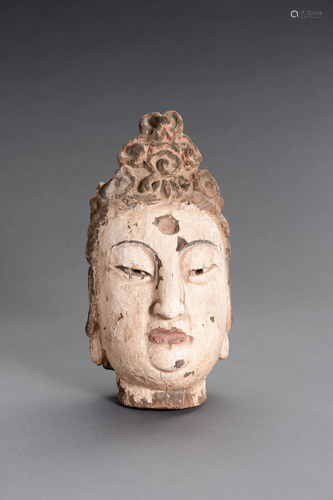 A CARVED POLYCHROME WOOD HEAD OF GUANYIN