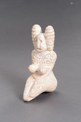 A STONE INDUS VALLEY STYLE FIGURE OF A GODDESS