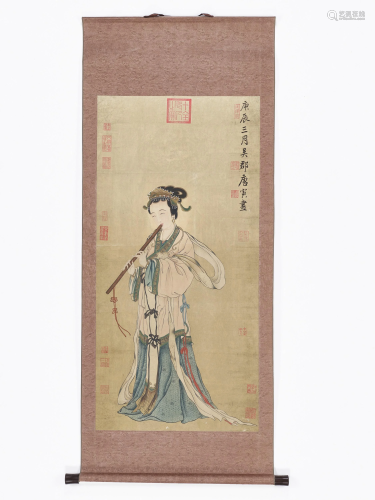 A SCROLL PAINTING OF A LADY PLAYING A FLUTE