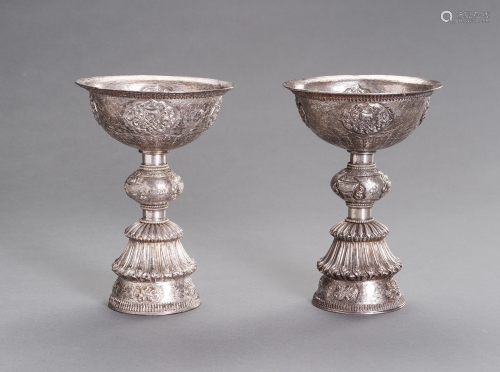 A LARGE PAIR OF SILVER BUTTER LAMPS