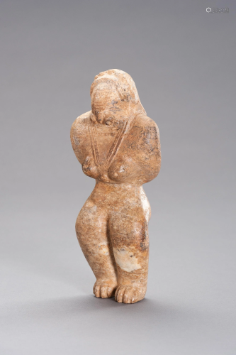 AN INDUS VALLEY STYLE STONE FIGURE OF A GODDESS