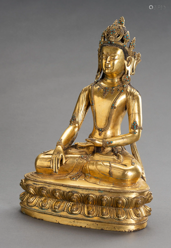 A LARGE GILT BRONZE FIGURE OF BUDDHA SHAKYAMUNI