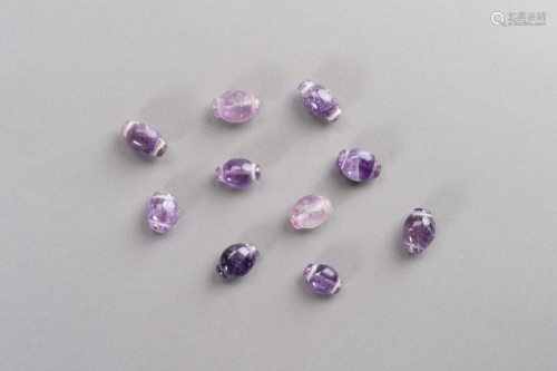 A FINE LOT WITH TEN ANCIENT AMETHYST BEADS