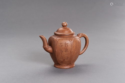 A YIXING CERAMIC TEAPOT AND COVER